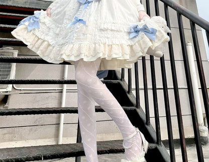 Strumpfhose mit Schleifenmuster und Herzen