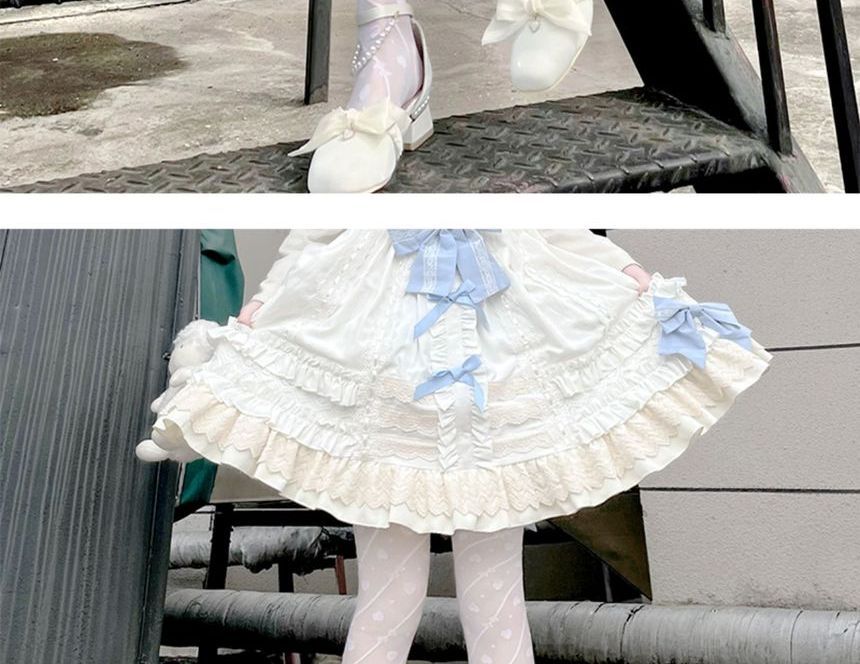 Strumpfhose mit Schleifenmuster und Herzen