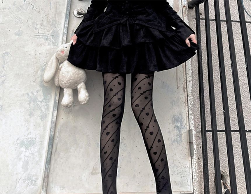 Strumpfhose mit Schleifenmuster und Herzen