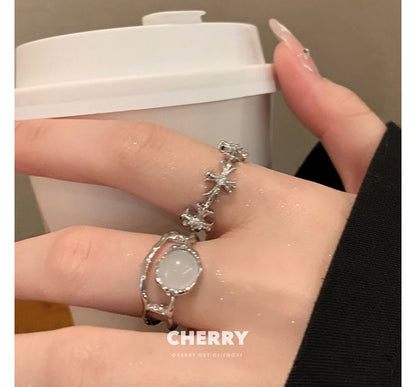 Offener Kunstring mit Mondsteinkreuz /