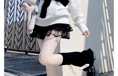 Leg Print Crisscross Chained Warmer