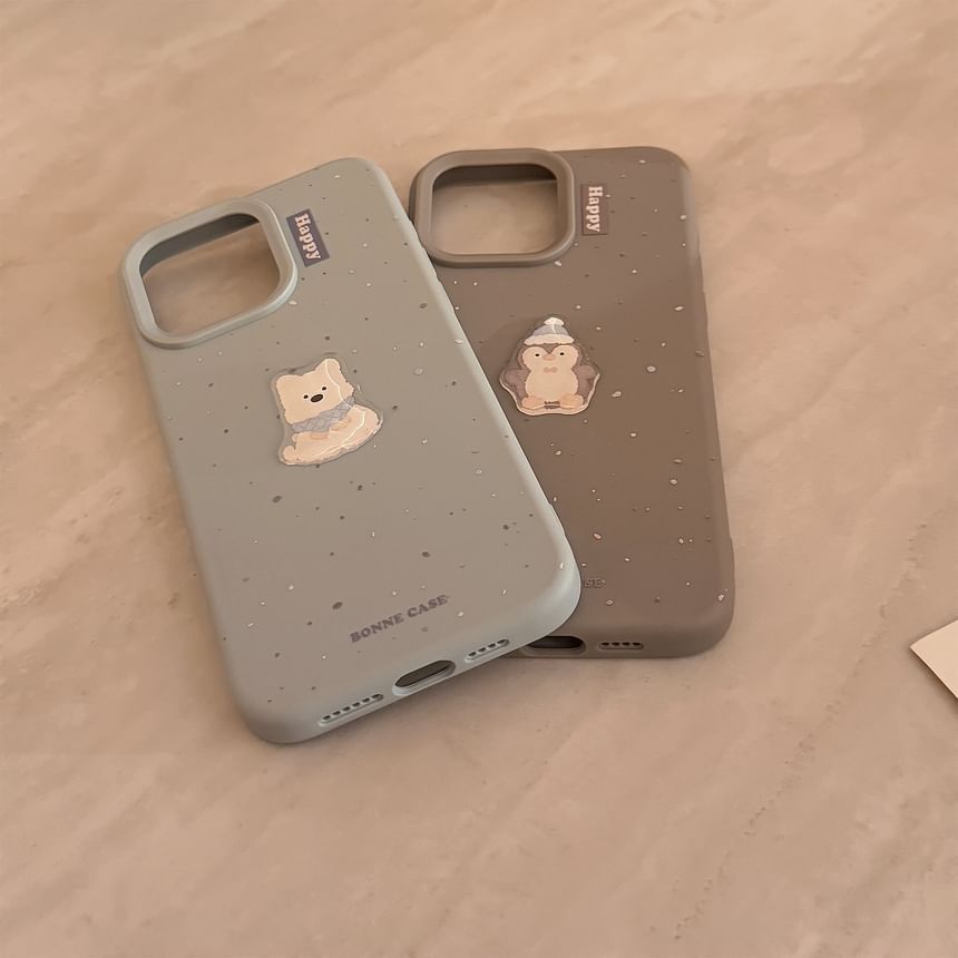 動物が飛び散ったケース付き携帯電話