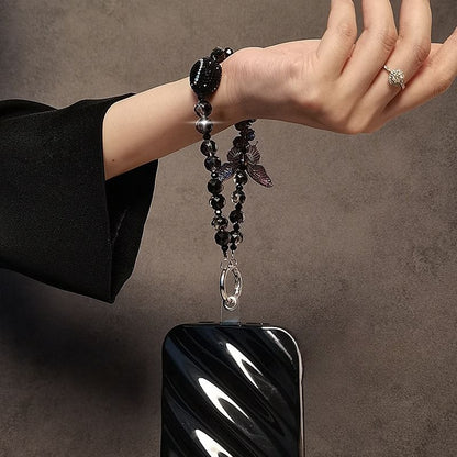 Schmetterlings-Handyband aus Kunstkristall