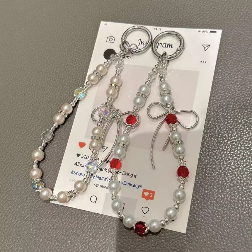 Schleifenpad mit Kunstperlen und Handy-Lanyard