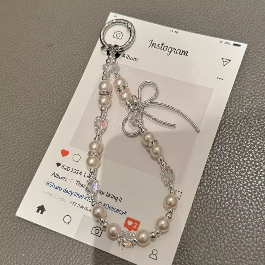 Schleifenpad mit Kunstperlen und Handy-Lanyard