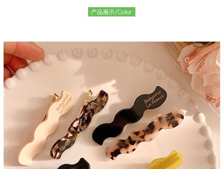 クリップヘアをウェーブ状にセット