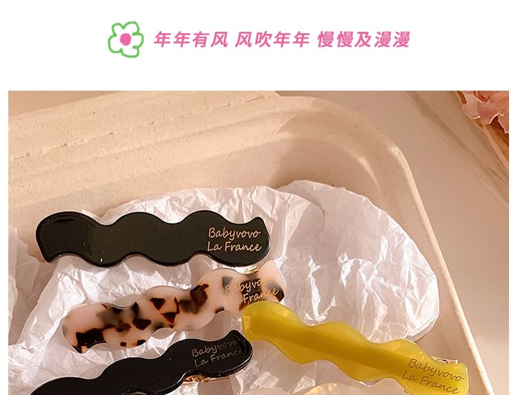 クリップヘアをウェーブ状にセット