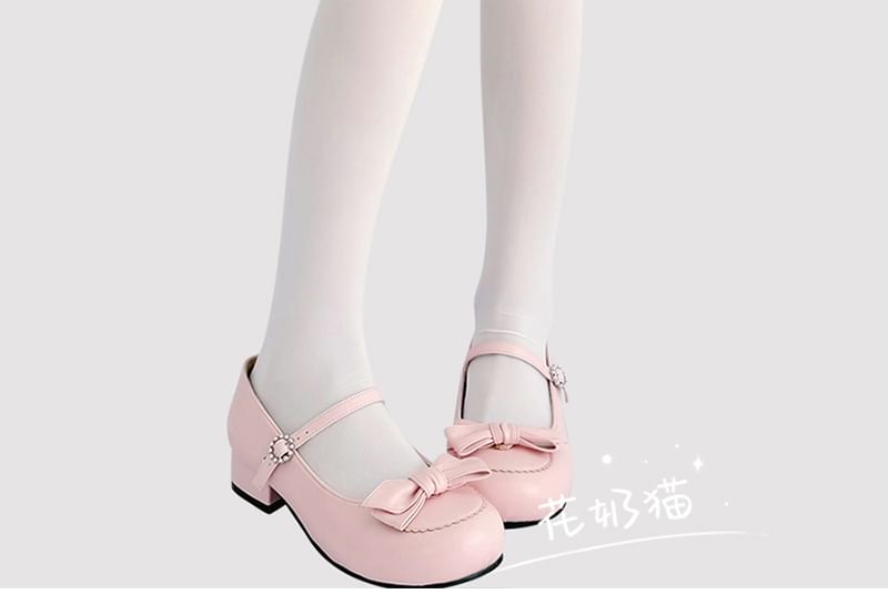 Transparente Strumpfhose mit Katzenmuster und Schleife