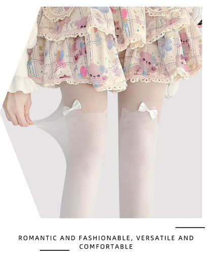 Transparente Strumpfhose mit Katzenmuster und Schleife