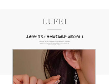 Perlenohrring mit Edelstein