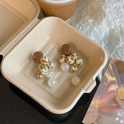 Tropfenperlen-Ohrring-Druck, Blumenstoff