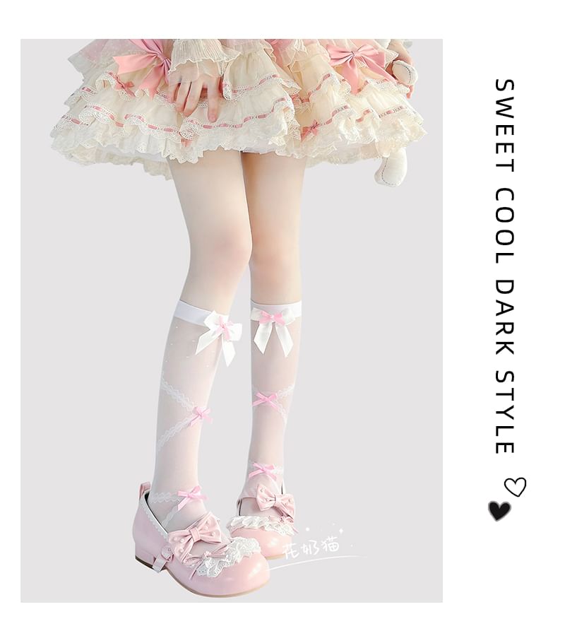 Hohe, transparente Kniestrümpfe mit Schleife