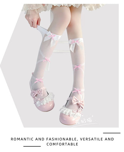 Hohe, transparente Kniestrümpfe mit Schleife