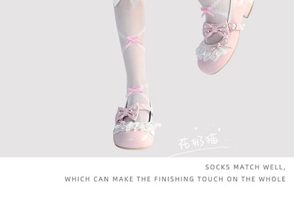 Hohe, transparente Kniestrümpfe mit Schleife