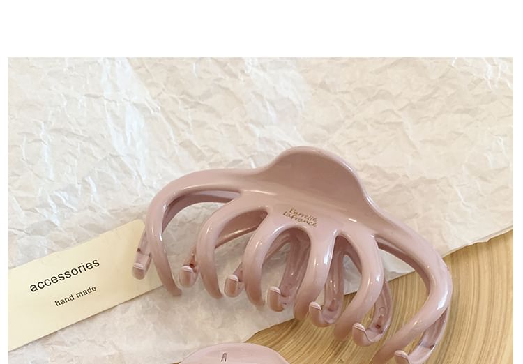 Haarkrallen-Schriftzug