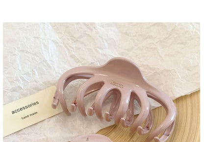 Haarkrallen-Schriftzug