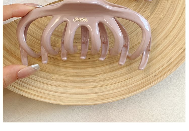 Haarkrallen-Schriftzug