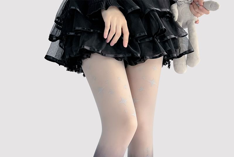 Transparente Strumpfhose mit Farbverlauf und Stern-Print