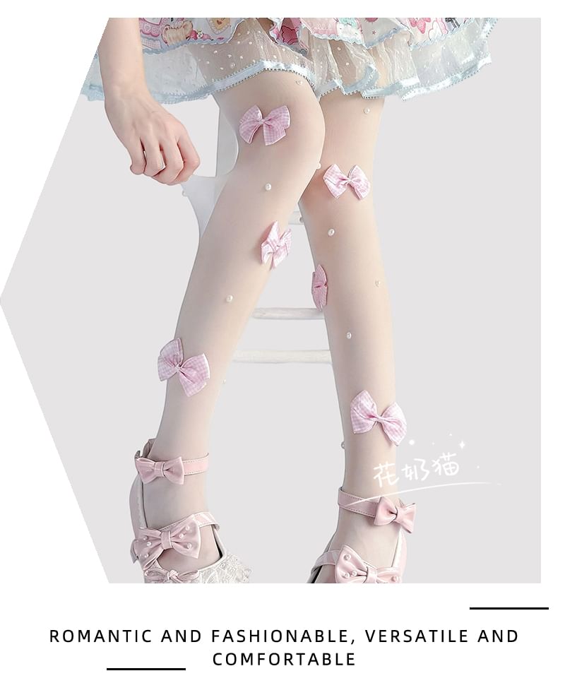 Transparente Strumpfhose mit Schleife