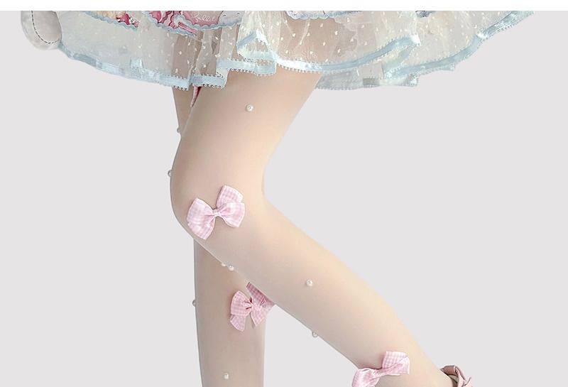 Transparente Strumpfhose mit Schleife