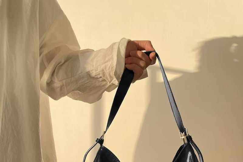 Faux Leather Buckled Grommet Shoulder Bag