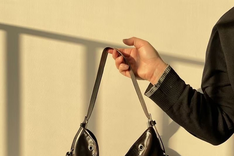 Faux Leather Buckled Grommet Shoulder Bag