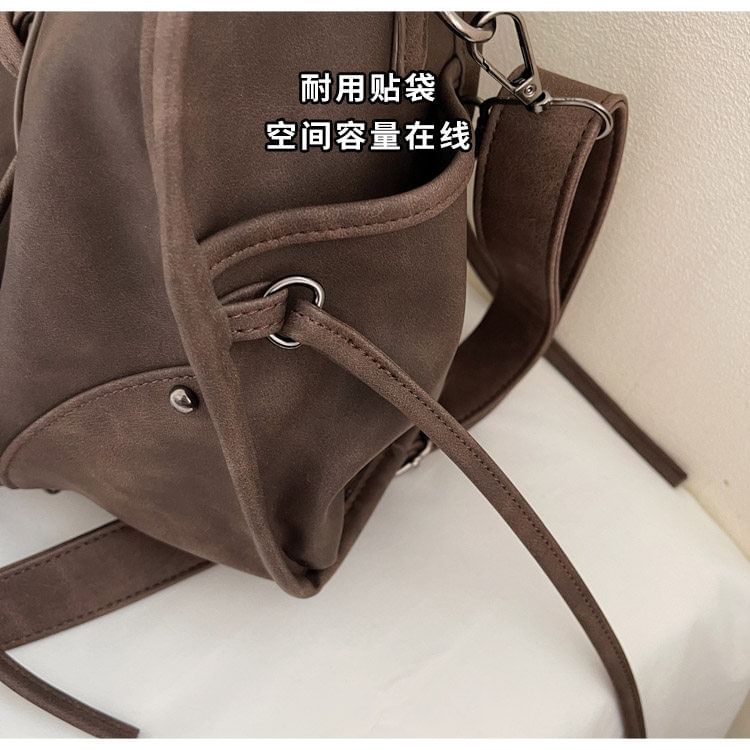 Lace Up Buckled Panel Shoulder Bag
