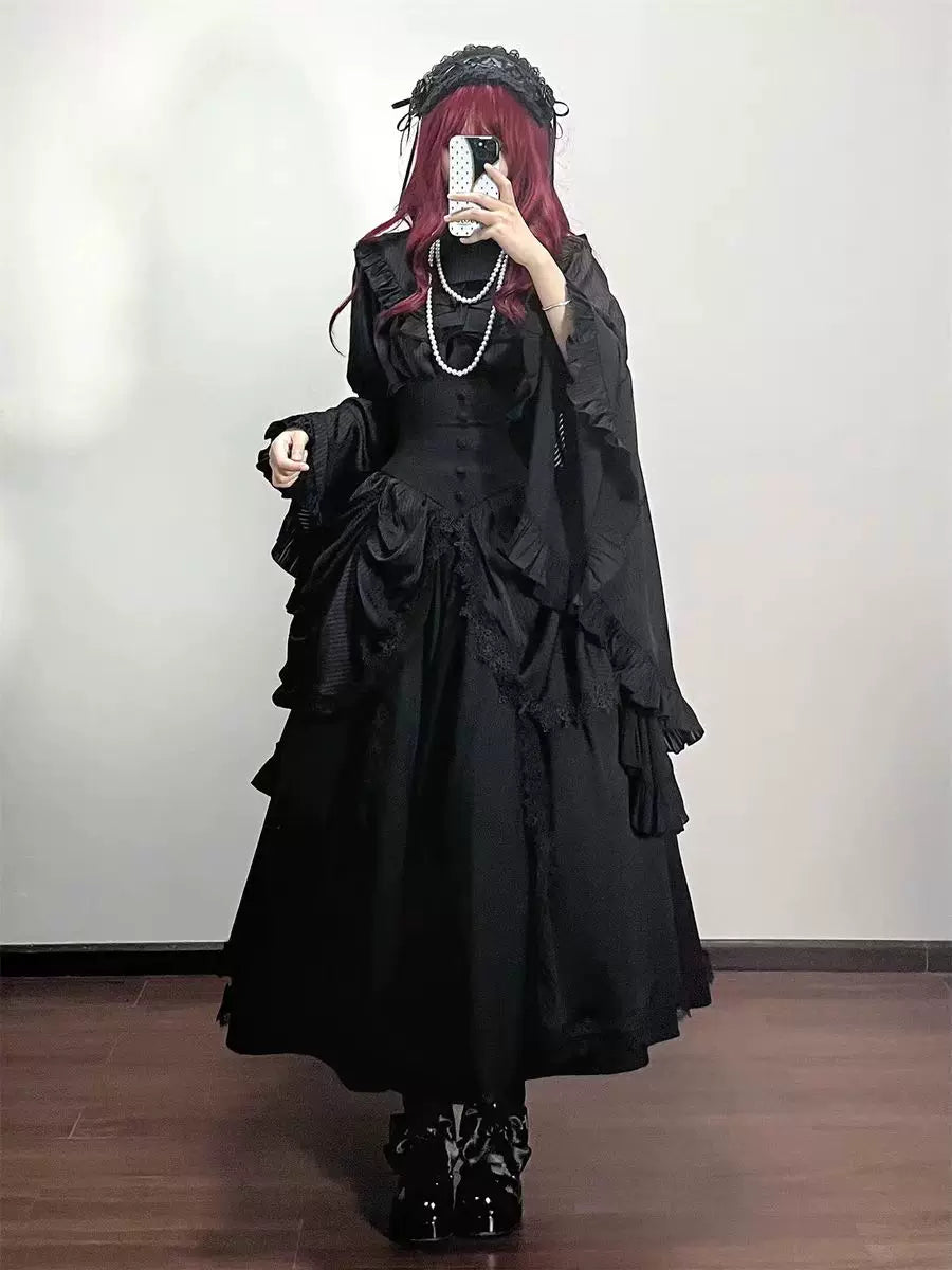 Black blouse and skirt outfit, styled mirror view