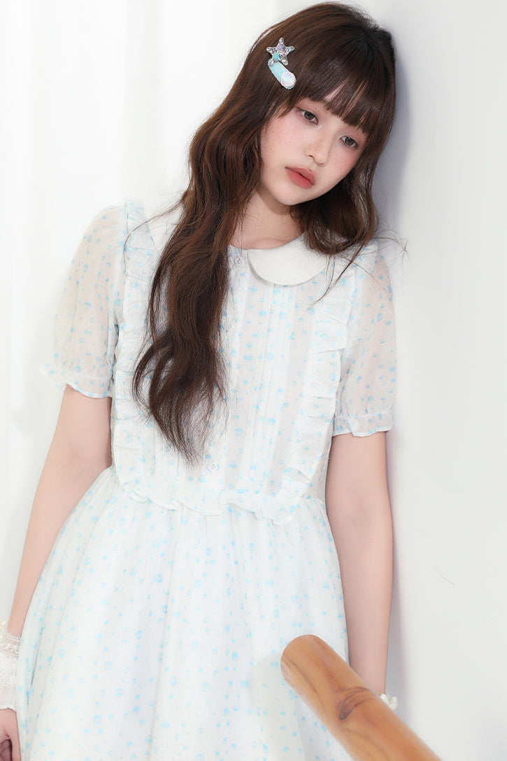 Puppe Ecosta Blumenkleid transparent