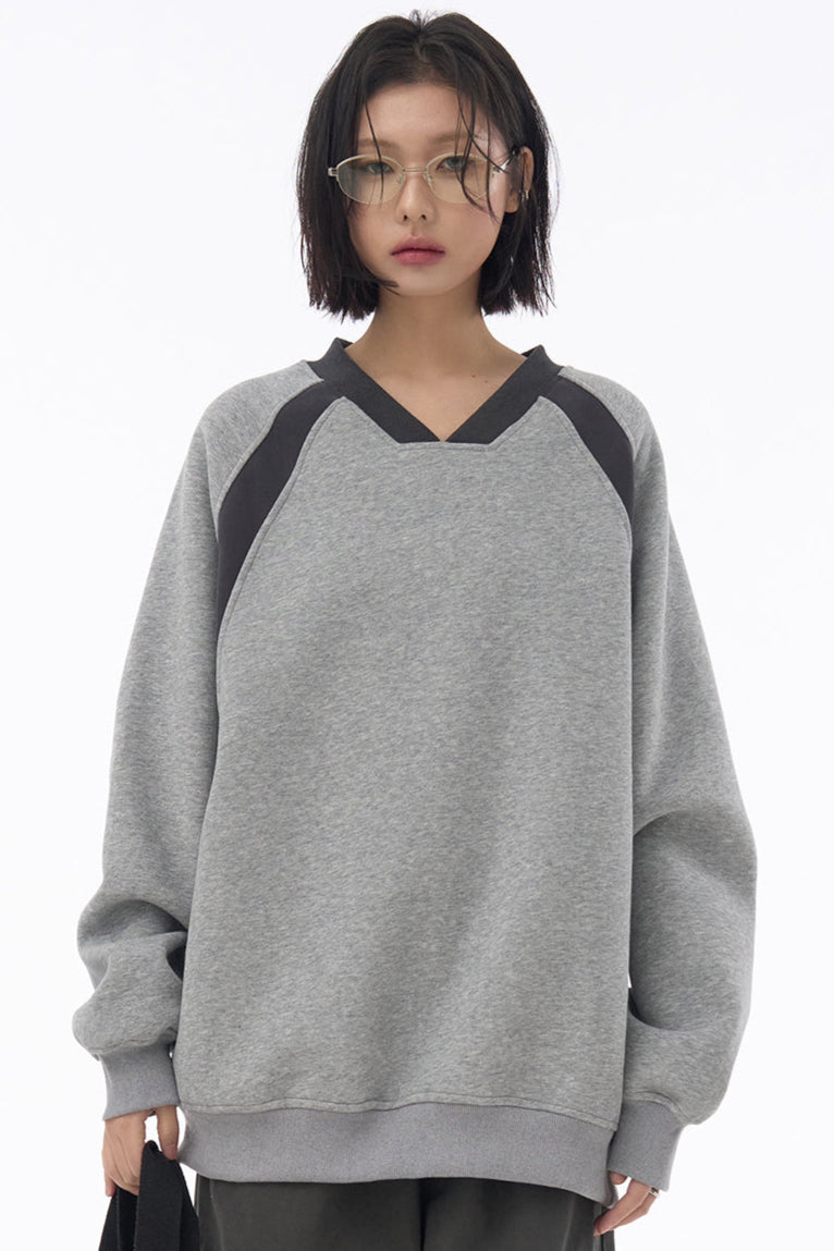 Patchwork-Pullover mit V-Ausschnitt
