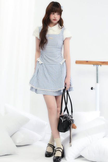Süßes kariertes blaues College-Kleid