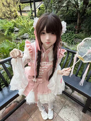 White and pink Chanhua Xu JSK set styled outdoors