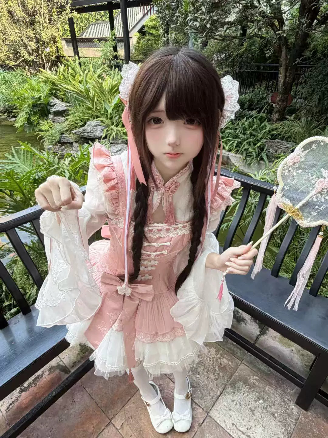 White and pink Chanhua Xu JSK set styled outdoors