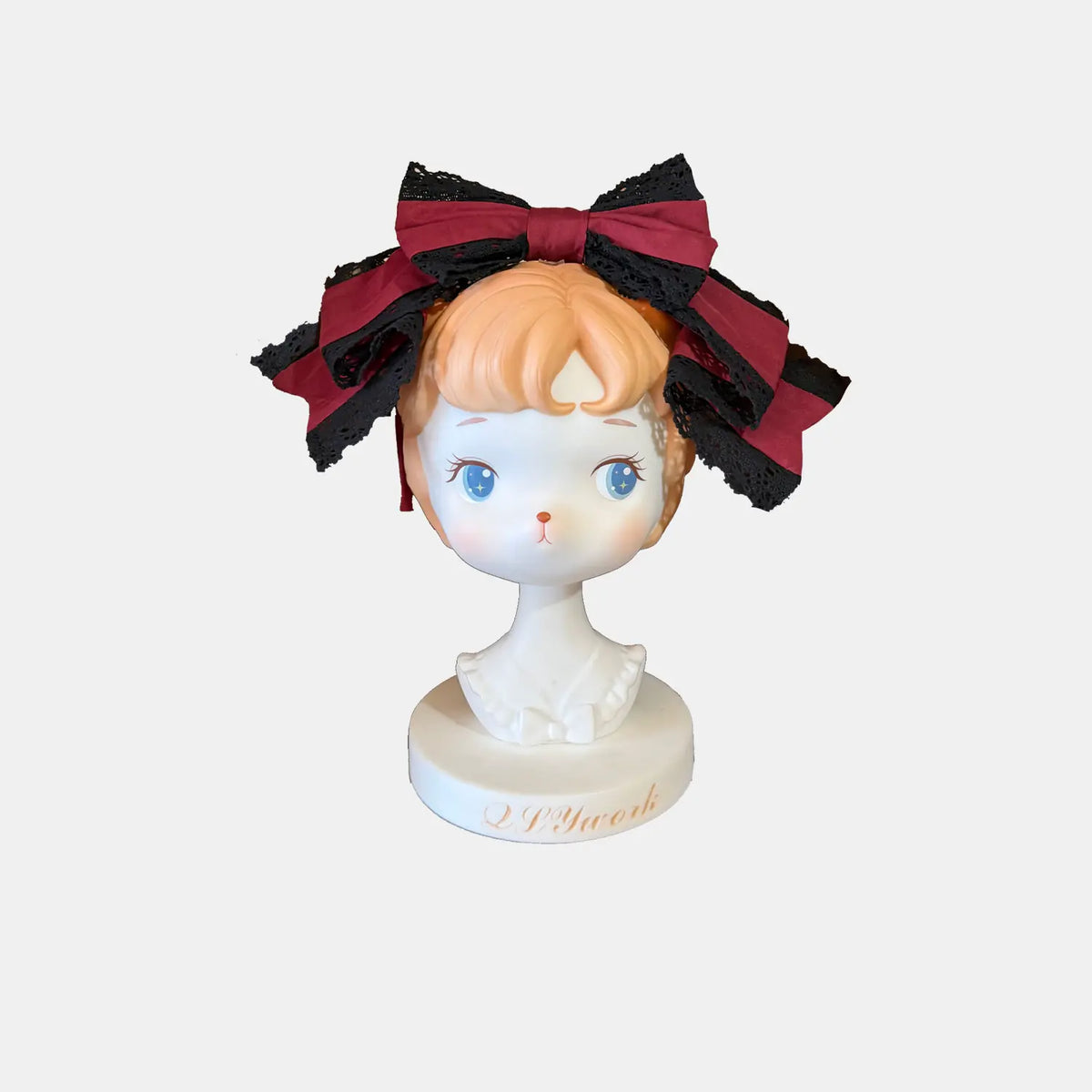 Burgundy Lace Bow Headband shown separately on a display stand