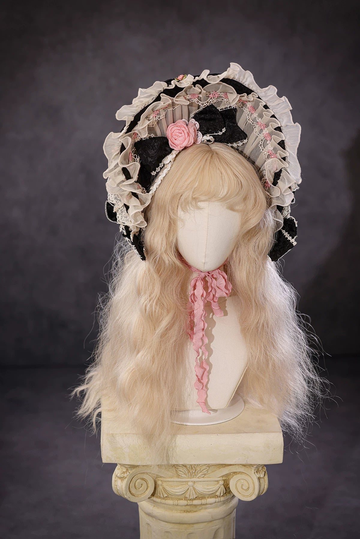 Antique Cake Nightfall Dance ruffled bonnet on display by BR Thorn Rose