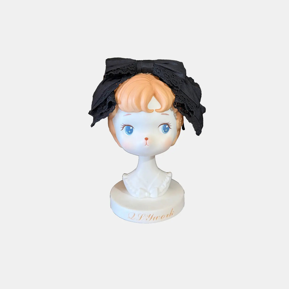 Black Lace Bow Headband shown separately on a display stand
