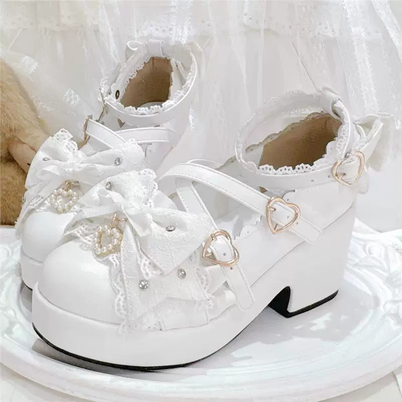 White bow platform Mary Jane shoes on display