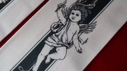Detailed cherub print on Gothic tights fabric