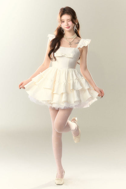 Fliegendes Cremefarbenes Kleid mit Spitzenärmeln und Puffärmeln