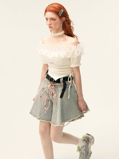 Spitzentop mit Schulterpartie und Tüll, hohes Blumenende, gestrickt