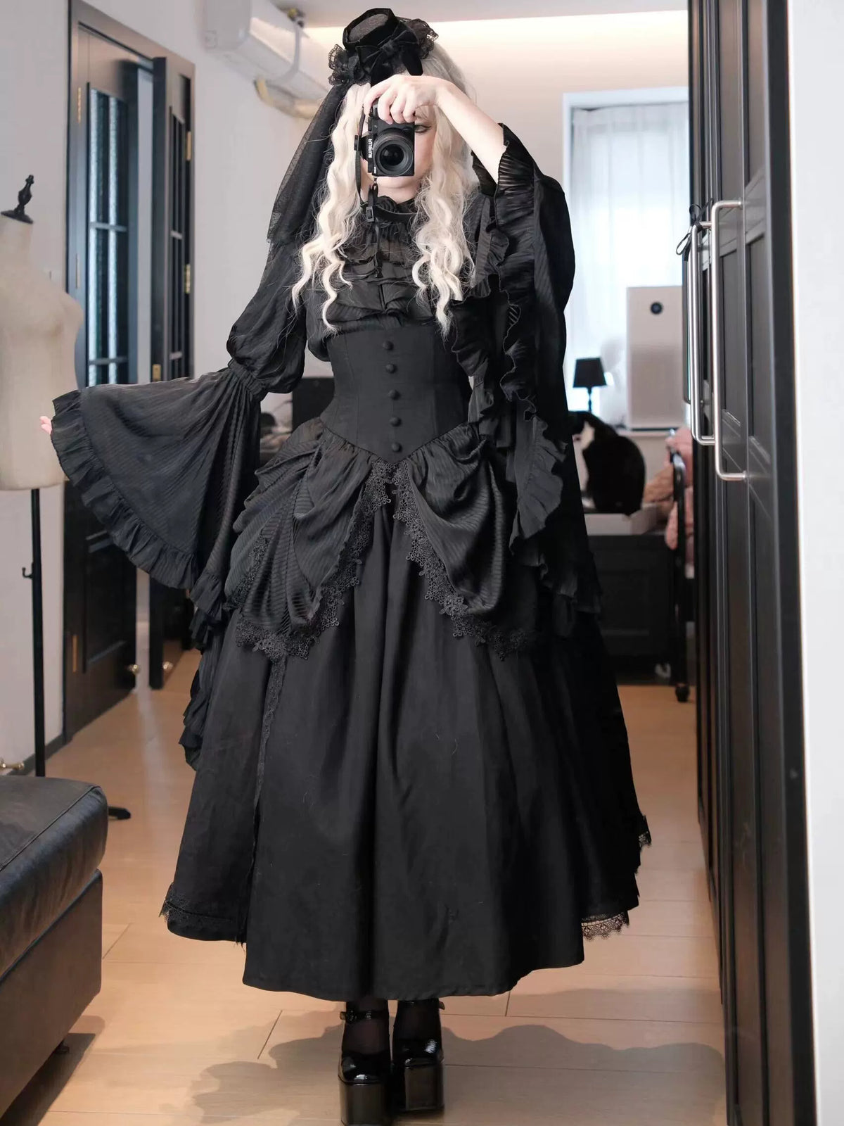 Black Gothic Lolita coordinate showing wide hime sleeves