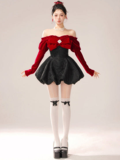 Schulterfreies Kleid mit großer Schleife und Center Jewel