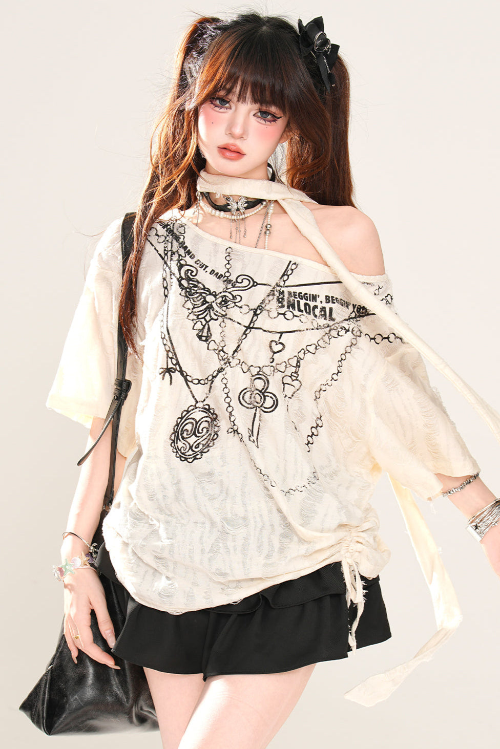 ワンショルダーのゆったりトップス Mine