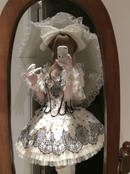 Beige corset and short skirt set styled with an inner top