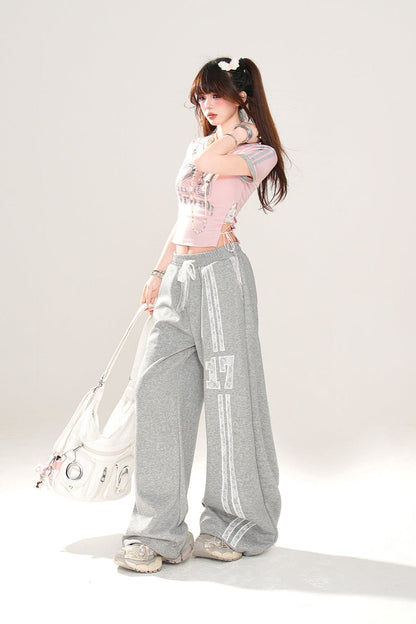 ロゴスポーティフローラルTシャツアート