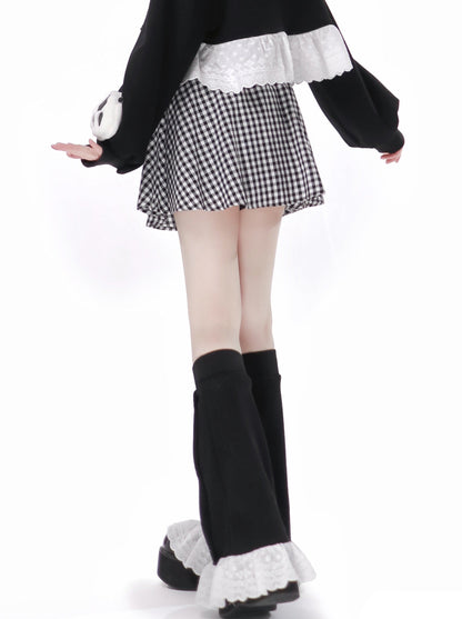 Plash Schwarzer Anzug mit langem Rock und Schweißband