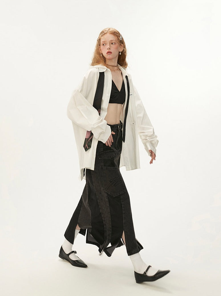 Schwarzer asymmetrischer Jeansrock aus Leder