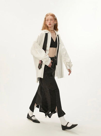 Schwarzer asymmetrischer Jeansrock aus Leder