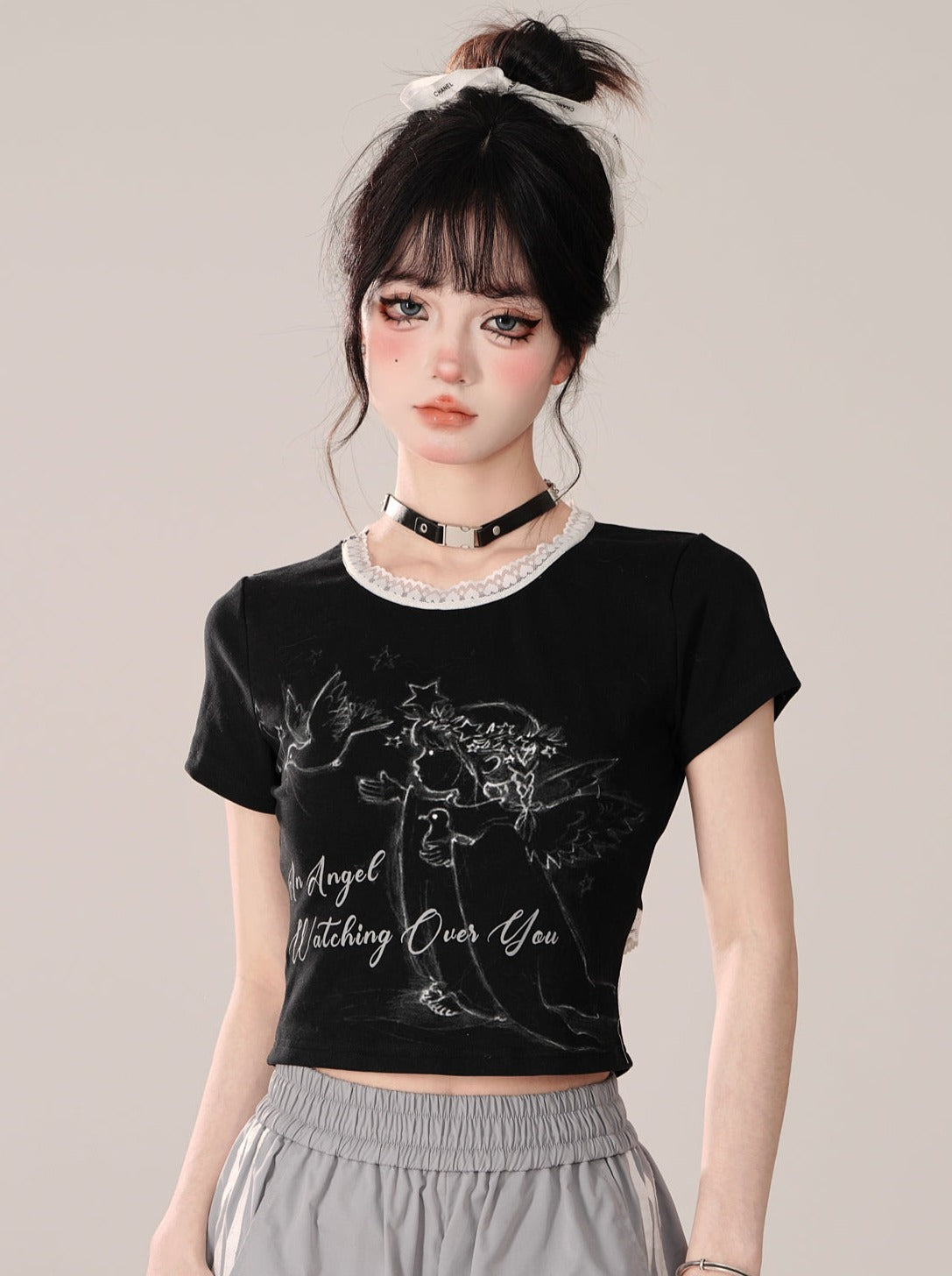 Schwarze Oberteile mit kurzem Design von Little Short Angel