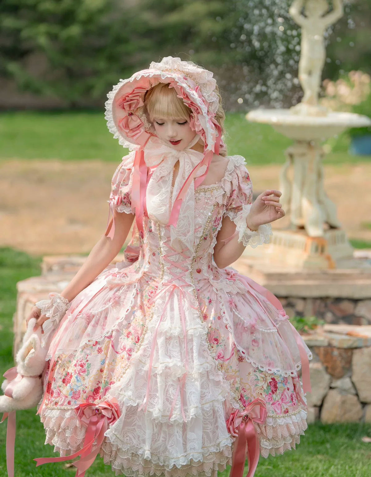Lily Rose OP dress in pink and white with floral motifs and ribbon details